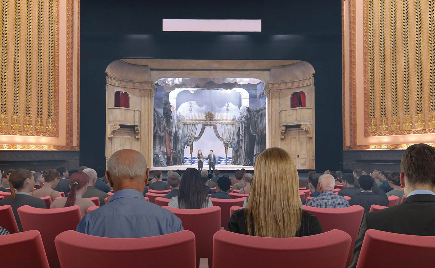 Man and woman sitting in offset seats in the Lyric Opera House that have a view of the opera stage.